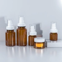 Luxury Wholesale 500ml 100ml 200ml 300ml Cream Jar Lotion Bottle PET Face Cream Serum Skin Care Packaging Cosmetic Bottle Set